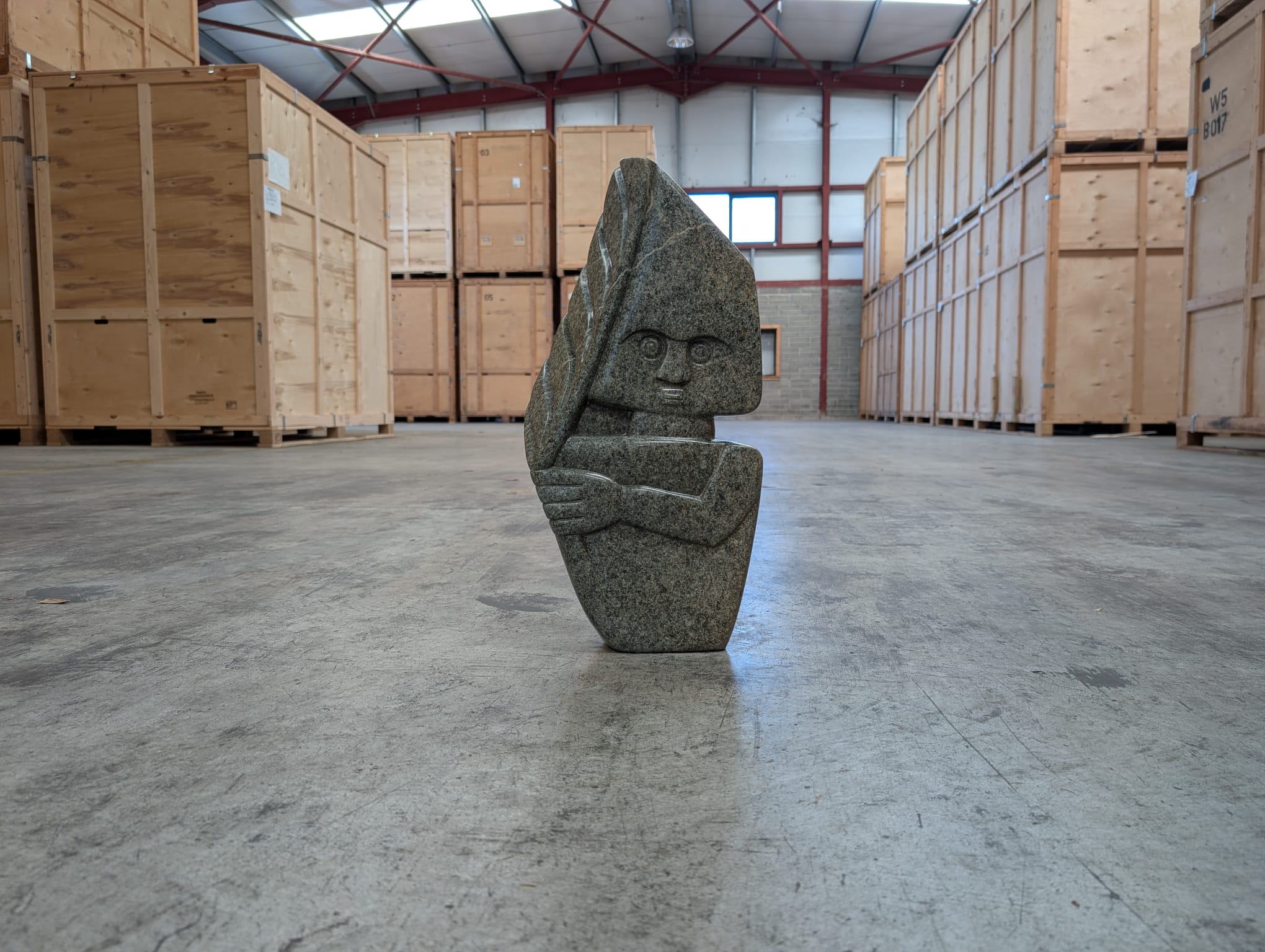 Palm Head, a stone sculpture by Edward Chiwawa