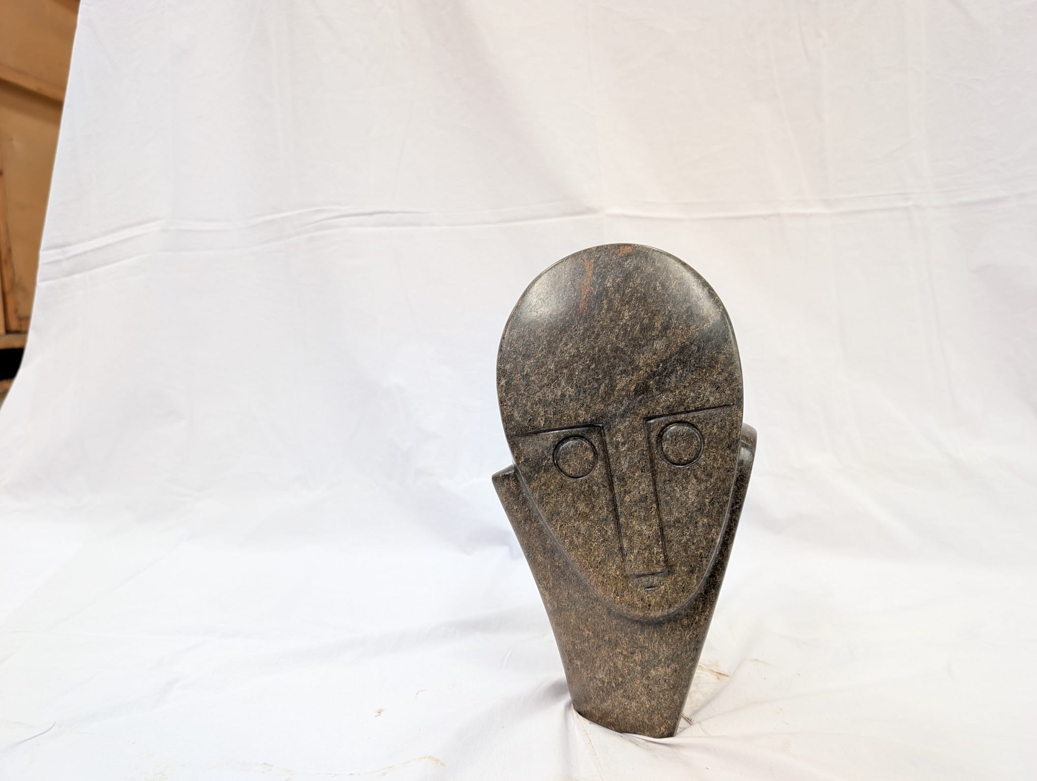 Widow, a stone sculpture by Henry Munyaradzi